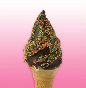 Soft serve cone topped with chocolate freckles